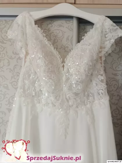 Sprzedam sukienkę z rękawkiem 